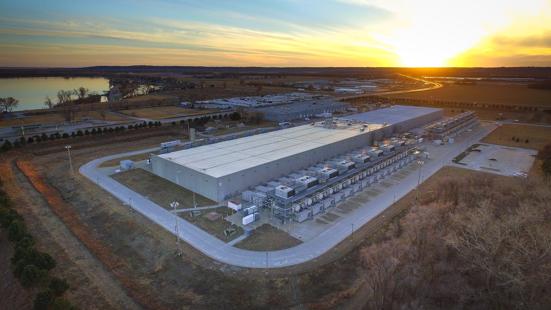 A hyperscale data center at dusk — the AI build-out's footprint, United States