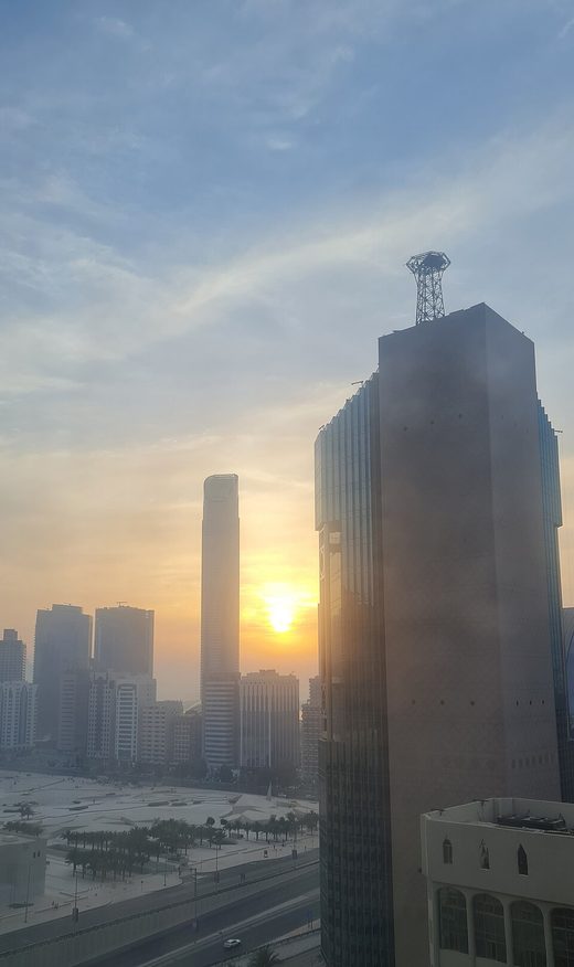 Sunset with the view of Landmark Tower from Sama Tower Abu Dhabi, United Arab Emirates