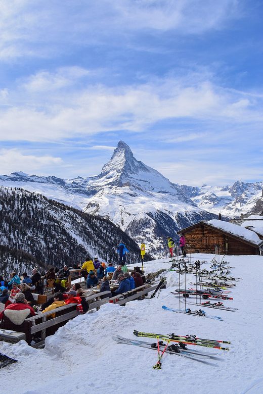 Matterhorn & wooden cottages & skiers, March 2019 (03), Switzerland